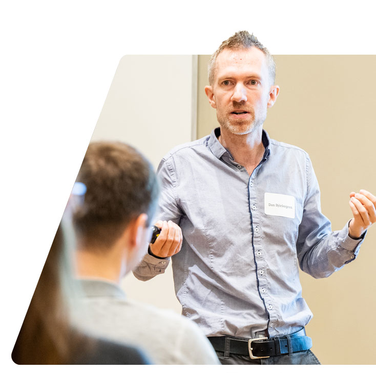 Assistant Professor of Economics Daniel Björkegren presents his research at a recent Bravo Center workshop..