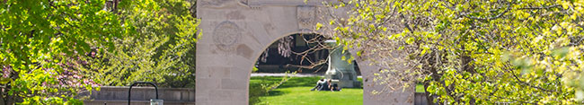 Soldiers Memorial Gate framed by early leaves
