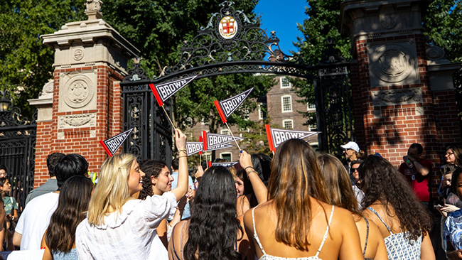 Brown students entering Van Wickle Gates at Convocation