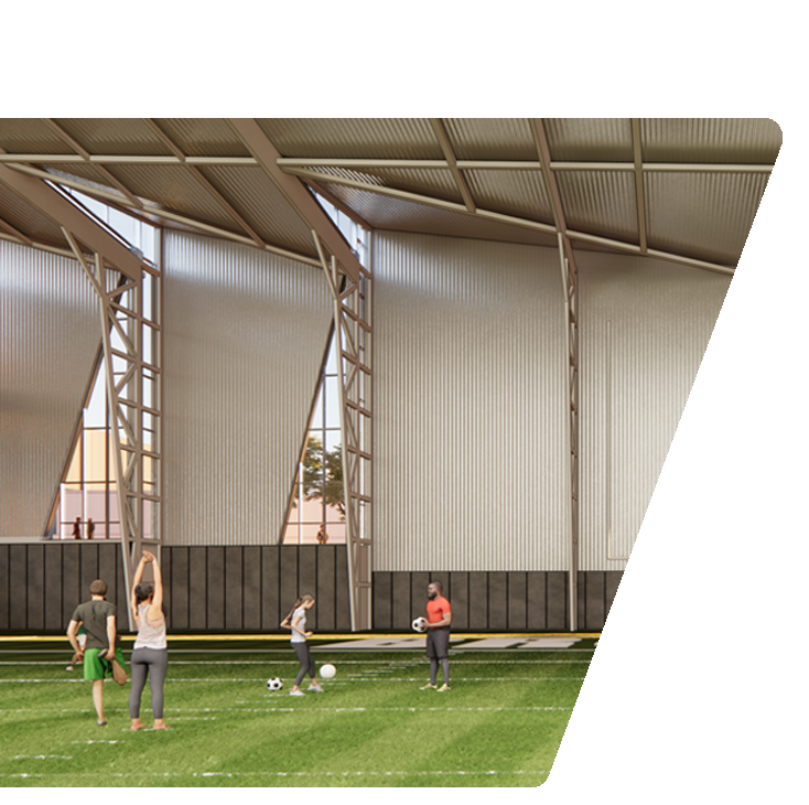 interior of indoor turf facility with students exercising