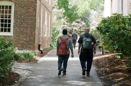 Students walking down a path on the Brown University campus