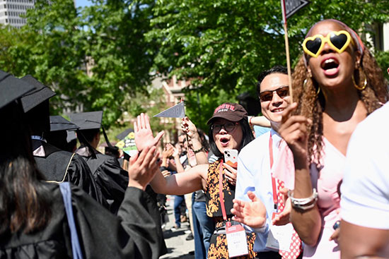 Alumni greet 2023 graduates at commencement procession