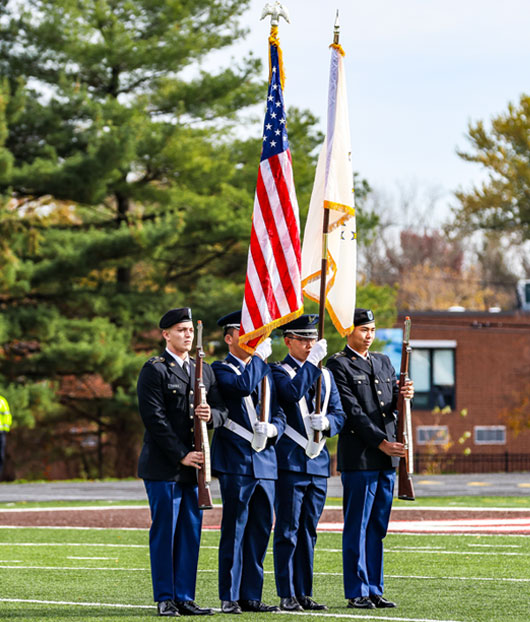 students in color guard on Brown campus