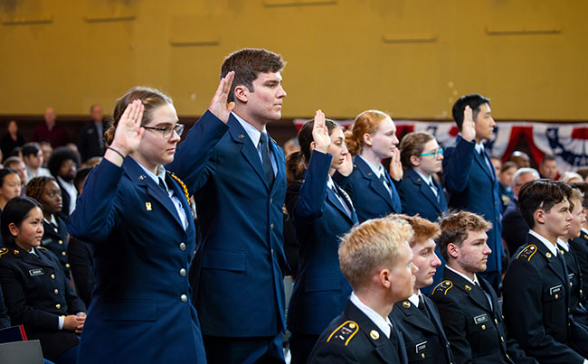 Air Force cadets standing to take their oath