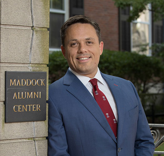 Carlos Lejnieks outside of Maddock Alumni Center