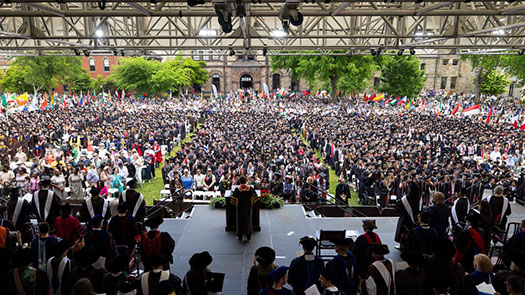 President Paxson in form of crowd of graduates at commencement ceremony